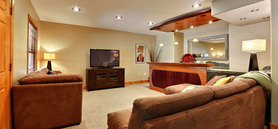 A Livingroom With an LED and a Beige Couch Copy